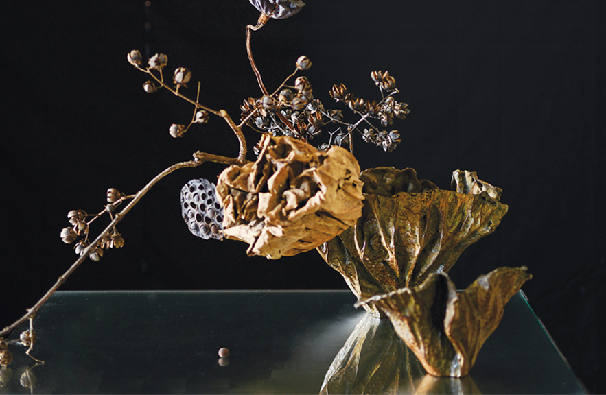 Bronze lotus leaf vessel by Alexander Lamont